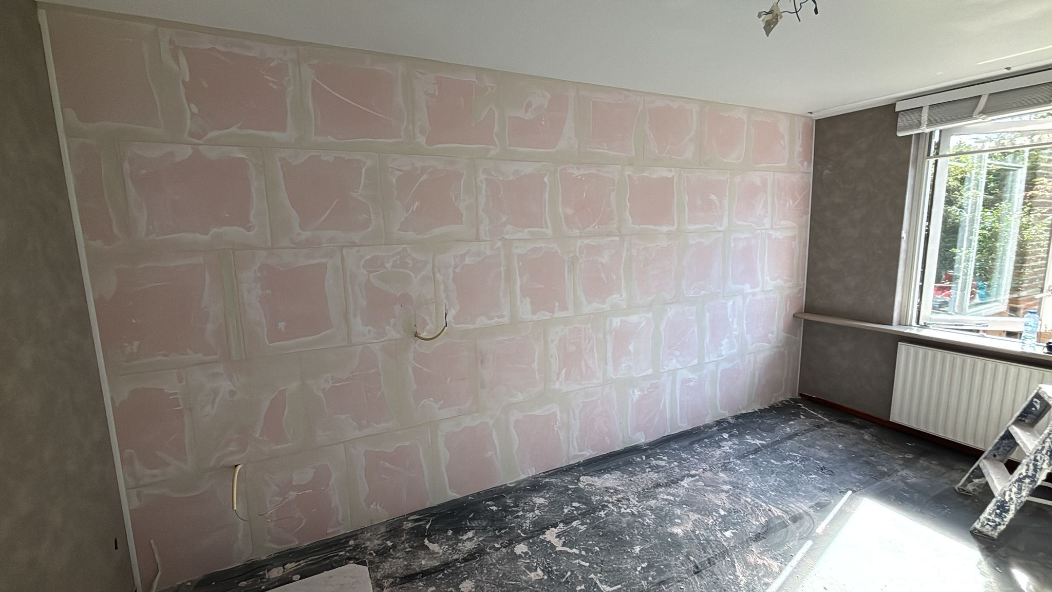 Geluidswerende tussenwand na overlast van de buren